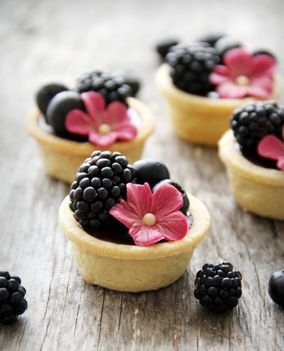 Chocolate tarts with  summer berries