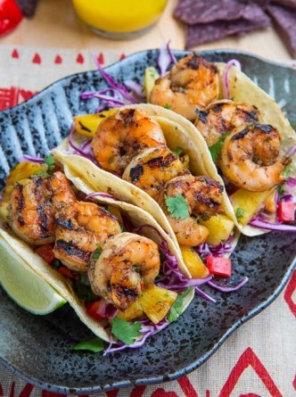 Jerk Shrimp Tacos with Pineapple Salsa, Slaw and Pina Colada Crema